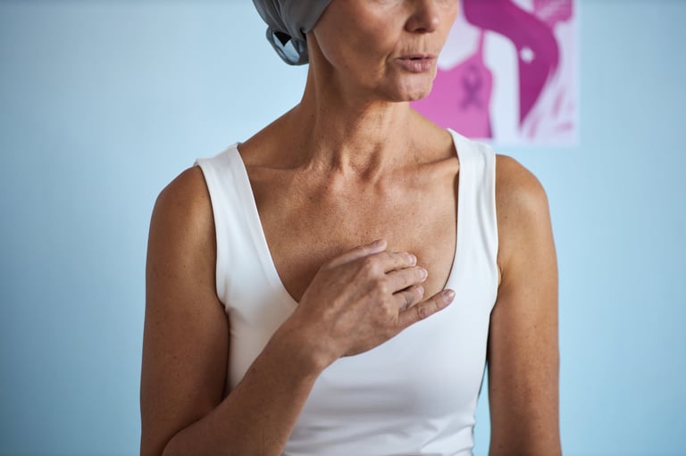 Woman reflecting during her cancer recovery and 3D areola restoration journey
