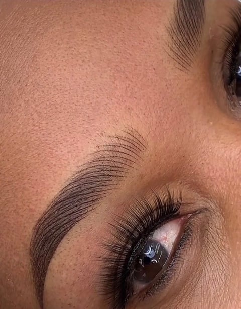 High arch permanent eyebrows in Bradenton, Florida — sculpted dark brow with dramatic lashes by CC Styling Studio