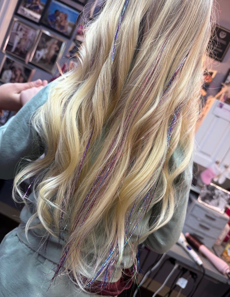 Blonde hair with purple and blue highlights in Bradenton, Florida by CC Styling Studio