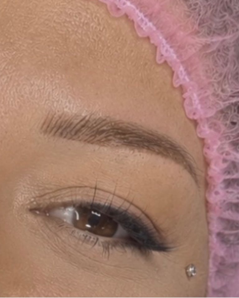 Beautiful natural-looking permanent eyebrows with microshading and hair strokes at the front blending into soft shading at the tail — healed brow result at CC Styling Studio in Bradenton, FL